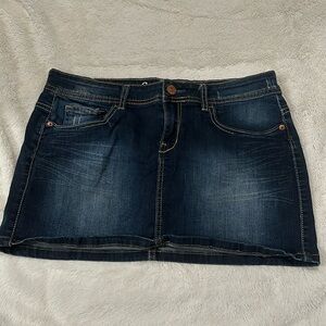 A 90s mini skirt so cute with a crop top or halter top